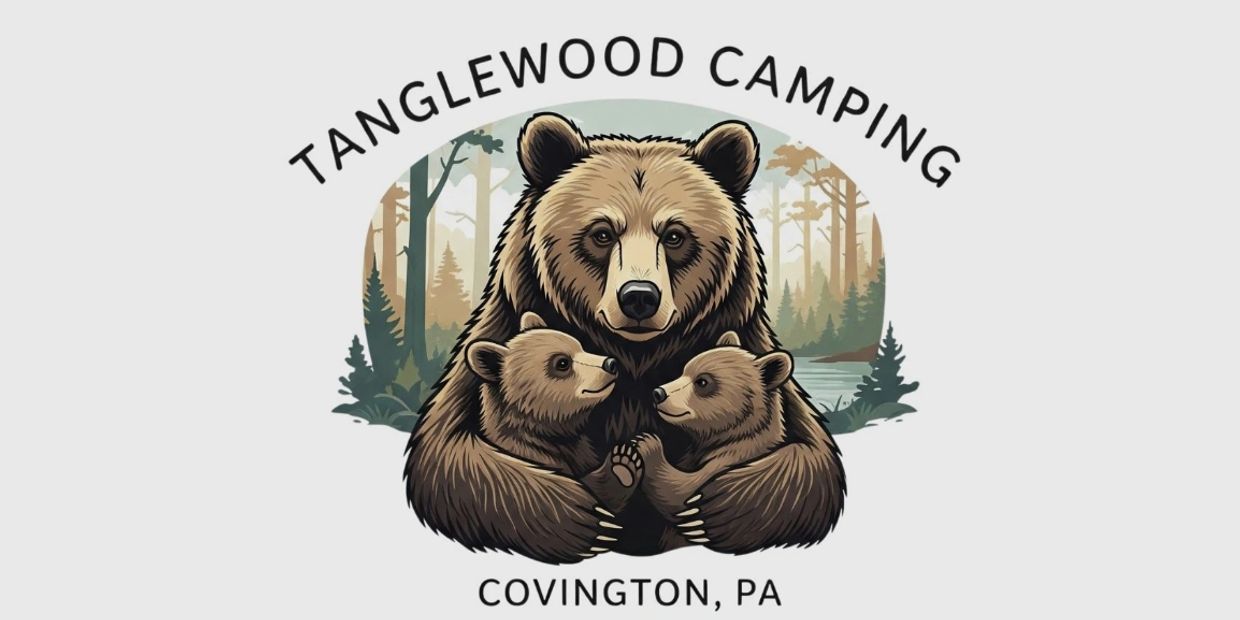Logo of Tanglewood Camping with a bear family in a forest setting.