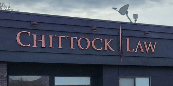 Custom lettering made by Forest Office Equipment for Chittock Law
