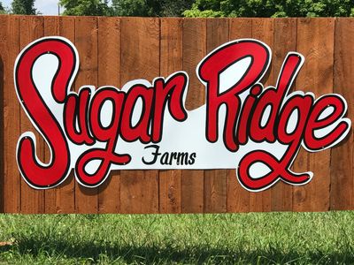 Greeting sign to the farm entrance.