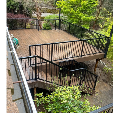 Custom cedar deck with black railing