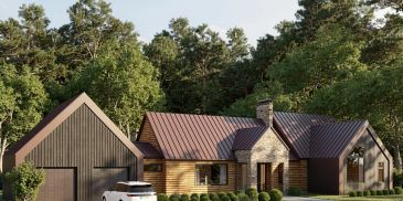 Modern rustic house with stone chimney and metal roof surrounded by greenery.