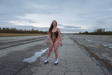 Maia Milas rollerskates urban landscape photo by Ian Reid