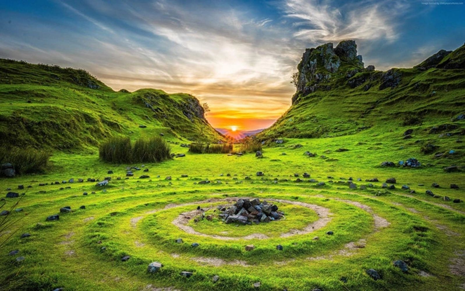 Spiral stone and grass at Fairy Glen on Isle of Skye, Scotland