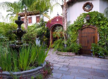 courtyard and fountain in front of buildings 