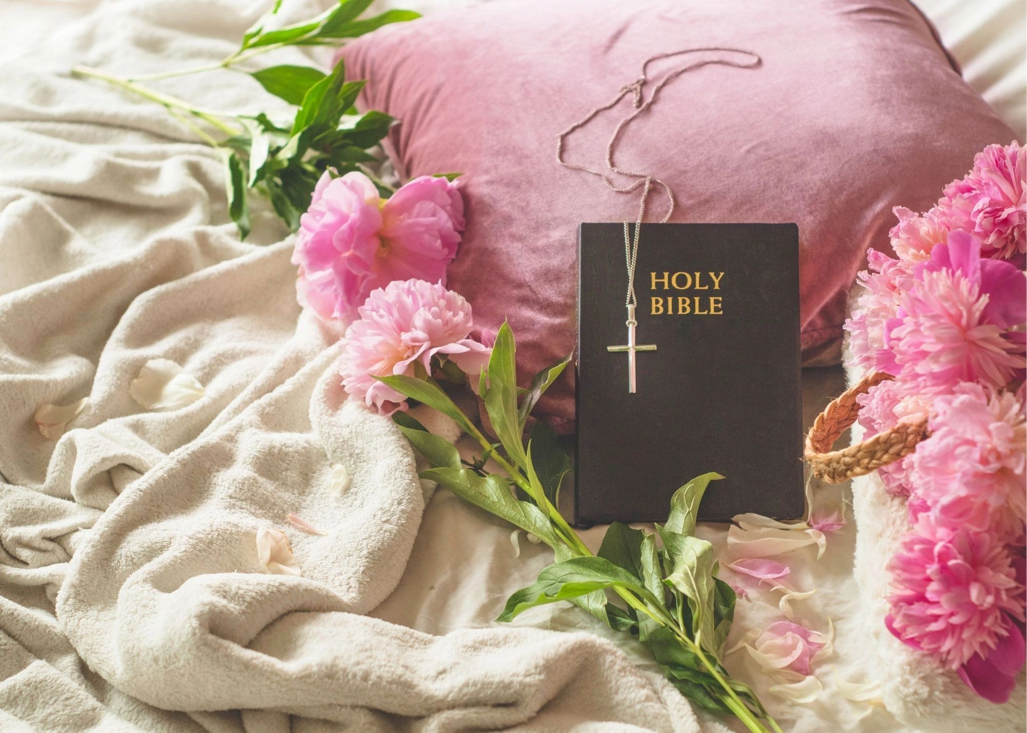 A bible on the bed with pink floral and a pillow, Inspirational daily quotes by Latisha McKinney