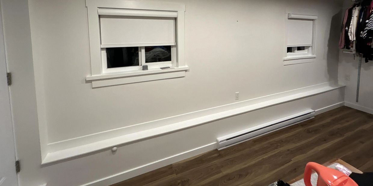 Animikii Restorations - New trim and full painting done for a Vancouver home.