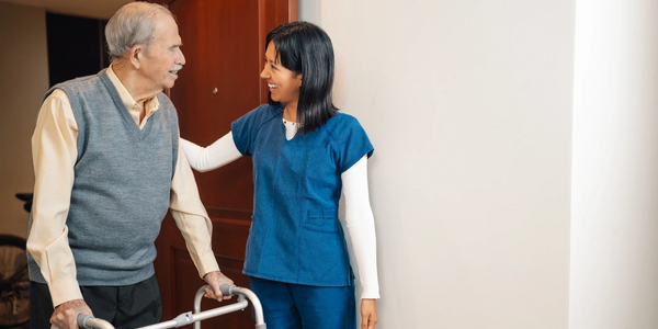 Caregiver helping with walking