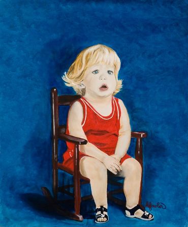 Toddler in red on rocker.