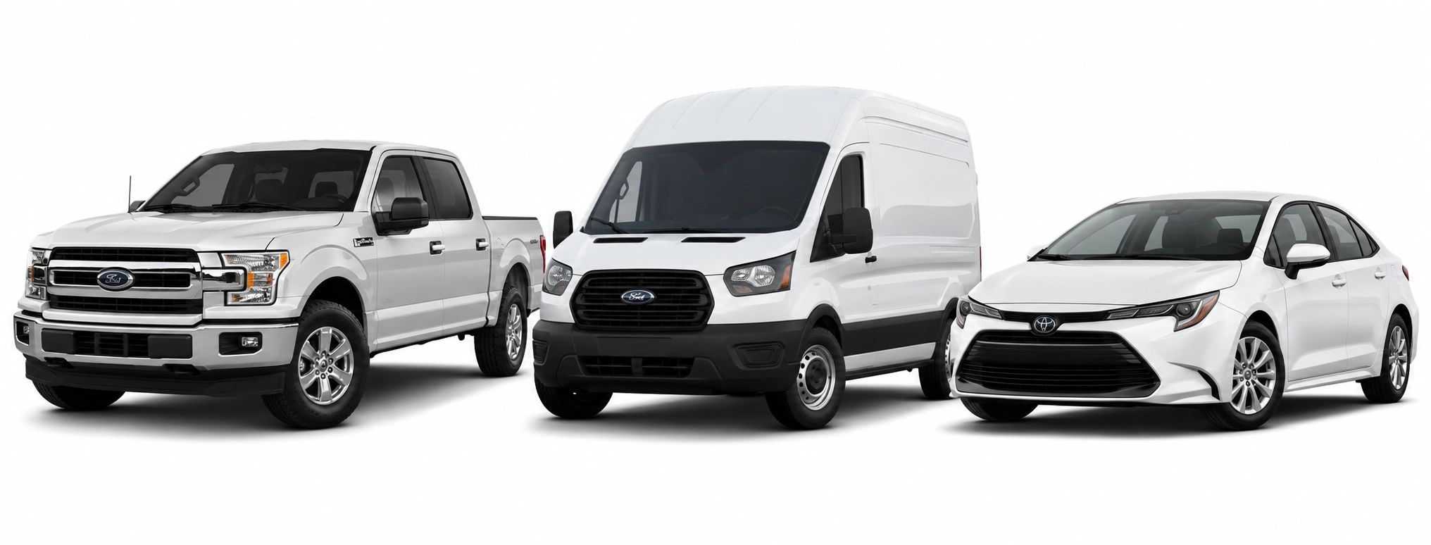 White Ford truck, van, and white Toyota sedan.
