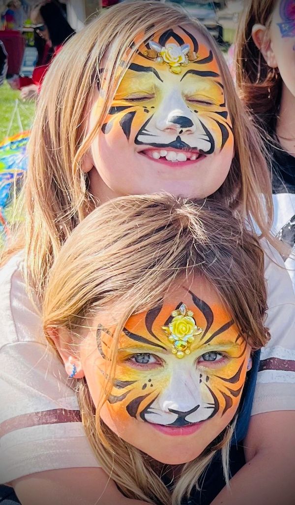 Tigers in the wild. Twining face paint