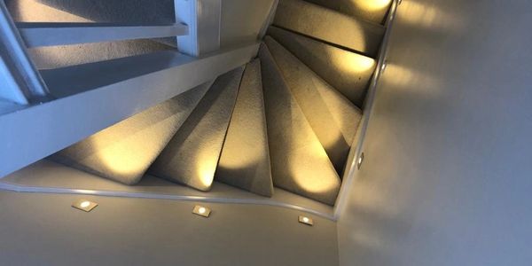 Bespoke stair LED lights leading to a loft extension. 