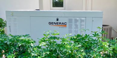 Generac generator unit outside a building.