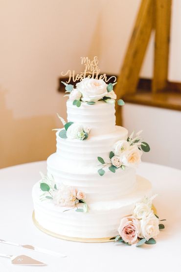 Horizontal lines and fresh flowers are sure to highlight simple elegance with a moist cake.