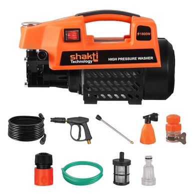 High pressure washer with accessories and hose for cleaning tasks.