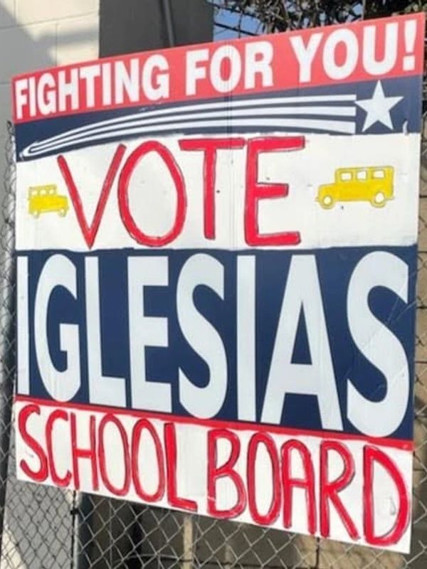 Campaign sign for Iglesias school board election.