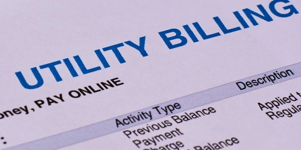 Close-up of a utility billing statement showing activity types and payment details.