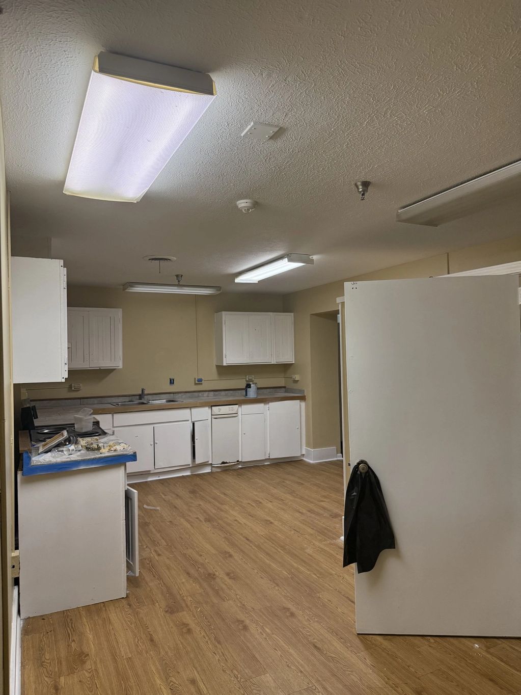 Kitchen space designated for shared meal preparation and daily use by residents