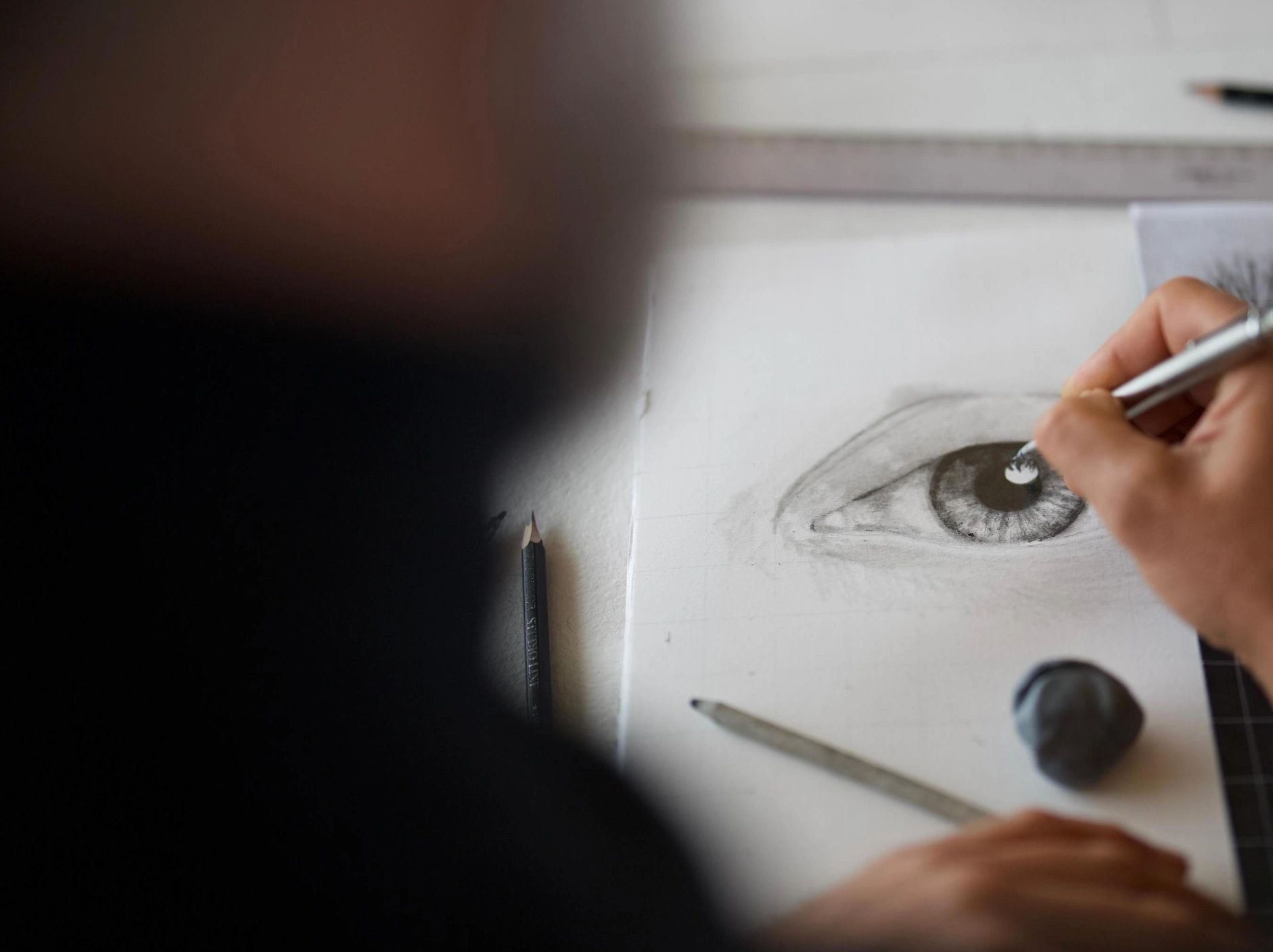 Das Lyon sketching a human eye for a sculptural work to follow.
