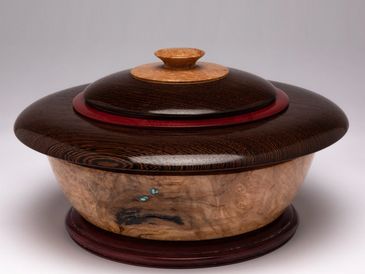 Image of Tabletop Cremation Urn 1218-01

Ext. Size: 11.5" d X 6" h
Int. Cap:  165 cu. in.
