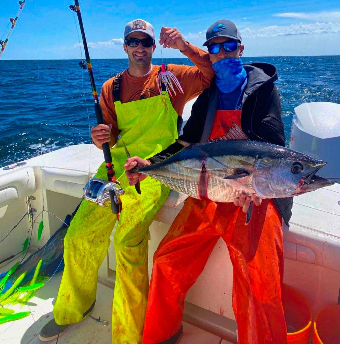 guys fishing for tuna using Magictail Hoomagic Ballyhoo trolling lures on a center console boat 