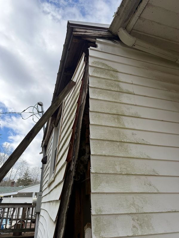 Side of a house that needs repair