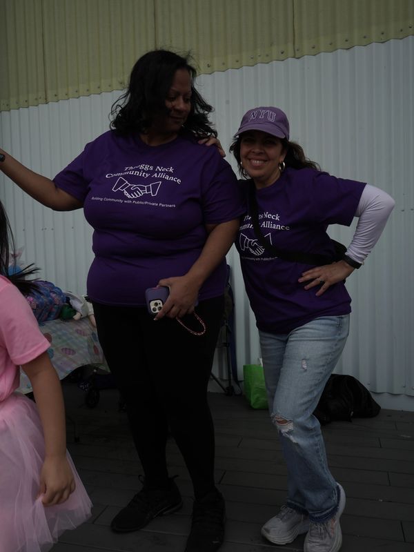 Angela and smiling volunteer