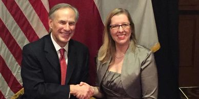 Governor Greg Abbott and Brooke Allen.