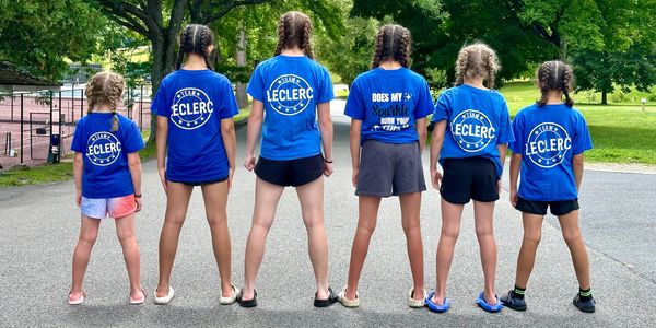 A group of six girls standing