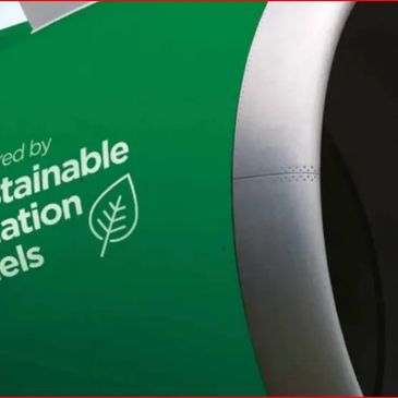 Airplane engine labeled as powered by sustainable aviation fuels with a leaf symbol.