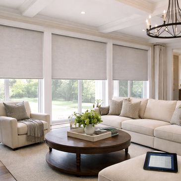 Luxury home interior featuring custom motorized window shades professionally installed 