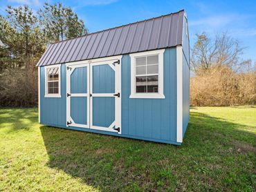 Lofted Blue shed portable with windows