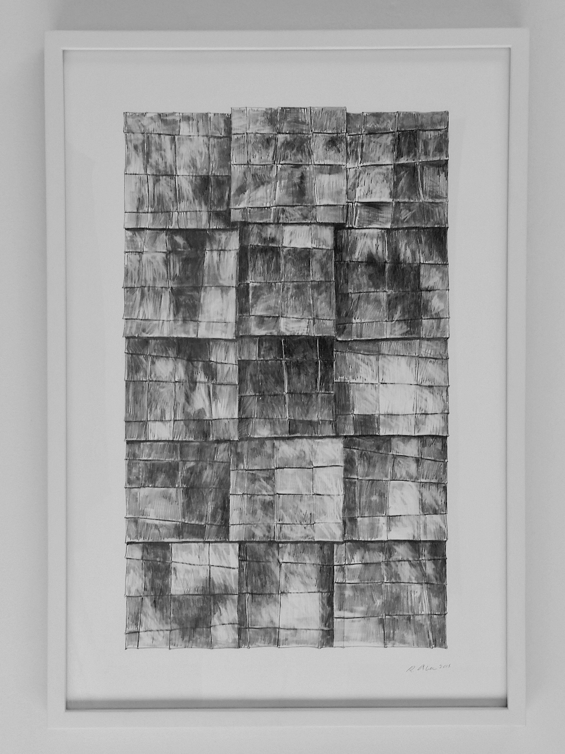 Black and white abstract grid artwork in a white frame.