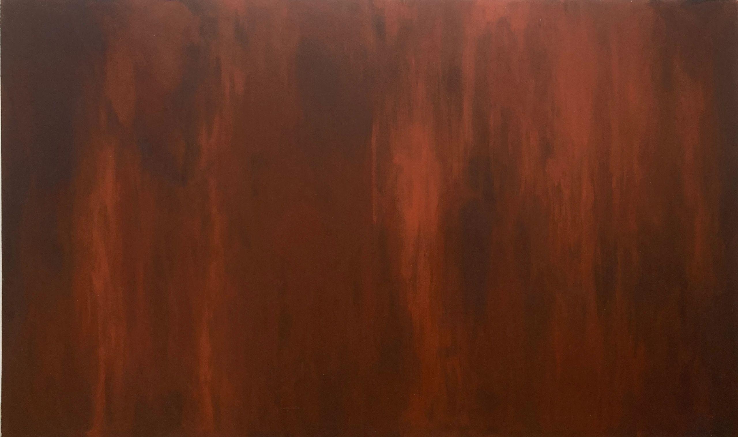 Close-up of rich, reddish-brown wood grain texture.