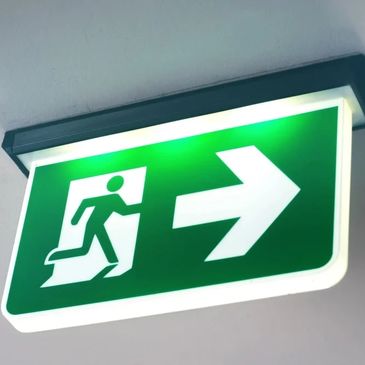 Exit sign, ceiling mounted