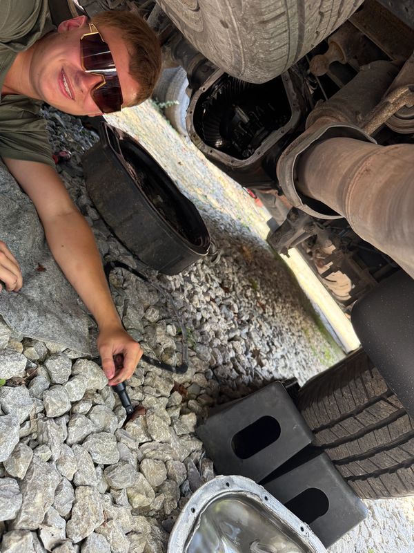 Oliver rideout at ultimate diesel working on upgrading a rear differential cover