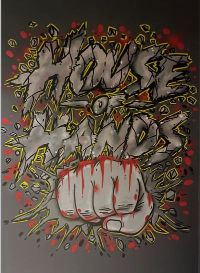 Graffiti art with a punch and bold text.