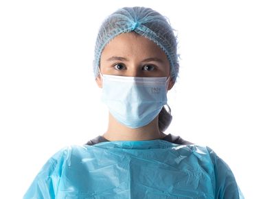 Healthcare worker wearing protective gear.