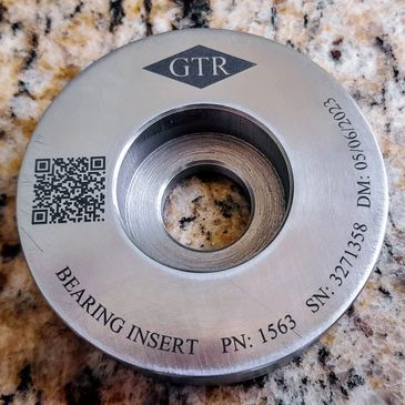 Bearing insert engraved with logo, part number, serial number, DOM and QR Code