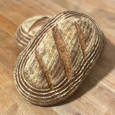 Whole wheat artisan bread—freshly baked, hearty, and perfect for healthy sandwiches and meals!
