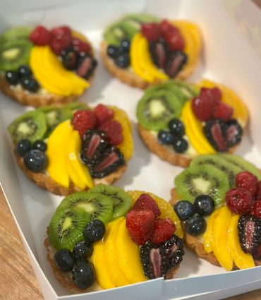 Colorful fruit tart made with a buttery crust, creamy custard filling, and fresh seasonal fruits.