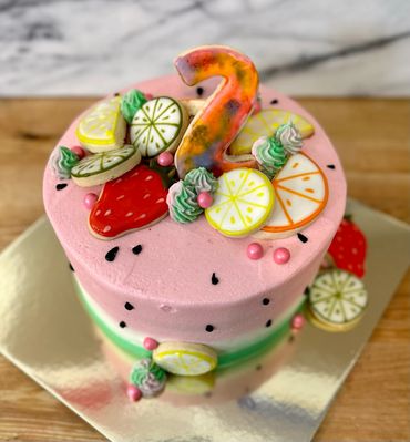 Fruit-themed 2nd birthday cake—colorful, fun, & perfect for celebrating your child's special day!