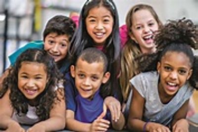 children are smiling towards camera 