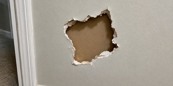 Drywall Repair (Before)