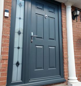 Anthracite Grey composite door with a full length glass side panel fitted in Forest Town Mansfield.