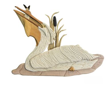 Pelican with a fish in its beak/gullet. 3D, made from various varieties of wood, no paint/stain.