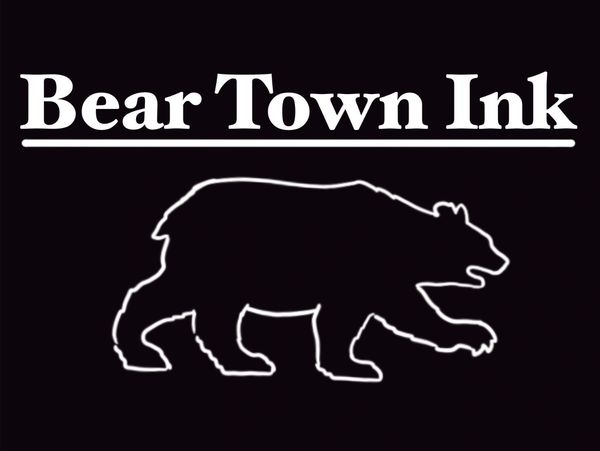 Logo of Bear Town Ink with a bear silhouette and white text on black background.