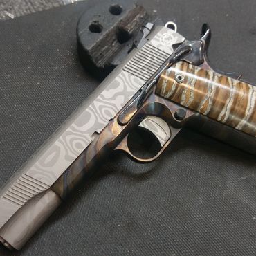 Custom 1911 we built from the ground up using Caspian frame and damascus slide with some mammoth ivo