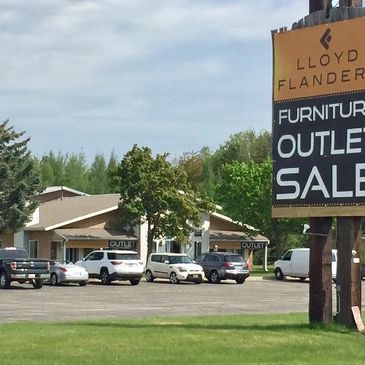 Outside image of Lloyd Flanders Furniture Outlet building and parking lot