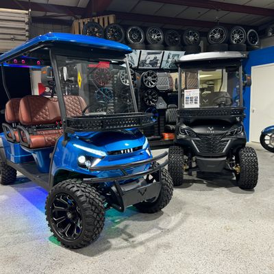 Vibe EV golf carts on showroom floor