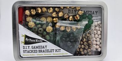 DIY stacked bracelet kit with beads and materials.